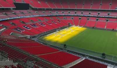 This photo taken on Wednesday, Aug. 9, 2017 shows a general view of Wembley Stadium in London. English soccer’s national stadium will stage Premier League matches for the first time, giving the competition its biggest-ever crowds. Tottenham will be moving into the 90-000-capacity Wembley for the season while a new stadium is built at its White Hart Lane home 12 miles (19 kilometers) across north London. (AP Photo/Rob Harris)