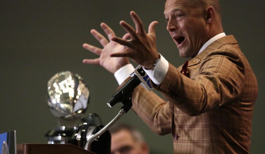 FILE - In this July 25, 2017, file photo, Minnesota NCAA college football head coach P.J. Fleck speaks at Big Ten Media Day in Chicago. The relentlessly energetic 36-year-old head coach has inherited a young team with major questions at quarterback, wide receiver and in the secondary. (AP Photo/G-Jun Yam, File)