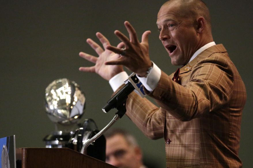 FILE - In this July 25, 2017, file photo, Minnesota NCAA college football head coach P.J. Fleck speaks at Big Ten Media Day in Chicago. The relentlessly energetic 36-year-old head coach has inherited a young team with major questions at quarterback, wide receiver and in the secondary. (AP Photo/G-Jun Yam, File)