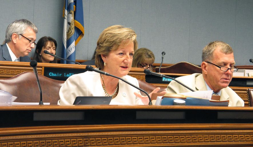 State Sen. Sharon Hewitt, R-Slidell, asks questions about the updated forecast of next year's $1.5 billion projected budget gap during a meeting of the Joint Legislative Committee on the Budget, on Friday, Aug. 11, 2017, in Baton Rouge, La. (AP Photo/Melinda Deslatte)