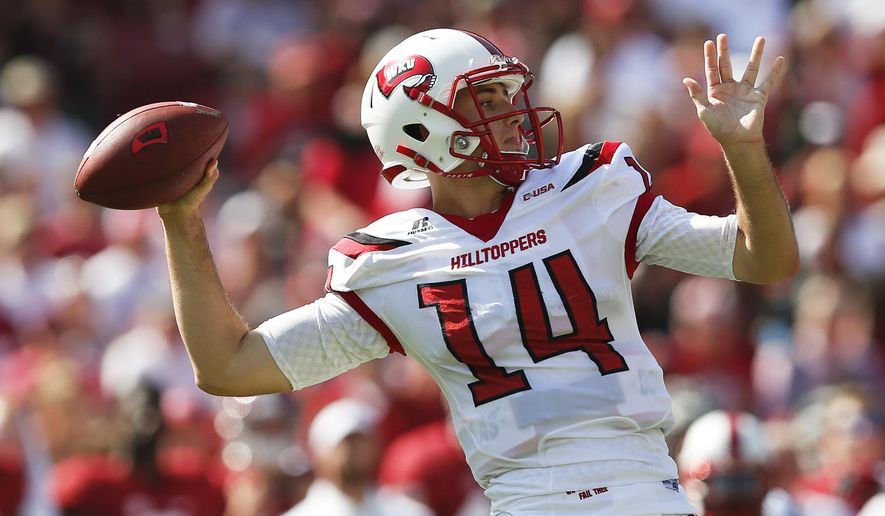 FILE - In this Sept. 10, 2016, file photo, Western Kentucky quarterback Mike White sets back to pass during the first half of an NCAA college football game against Alabama, in Tuscaloosa, Ala. White had eight 300-yard passing games last season. He was fifth in FBS with his 4,383 yards, while throwing for 37 TDs with only seven interceptions.(AP Photo/Brynn Anderson, File)
