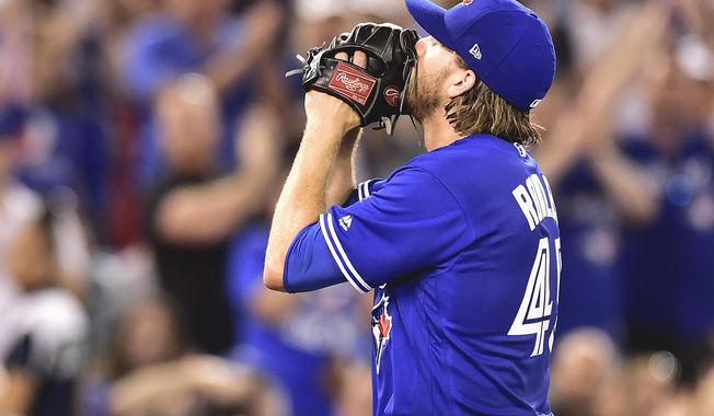 Toronto Blue Jays starting pitcher Chris Rowley reacts after being pulled from the game, having given up a single run, during sixth inning AL MLB baseball action, in Toronto on Saturday, Aug. 12, 2017. (Frank Gunn/The Canadian Press via AP)