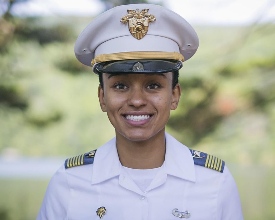 In this Aug. 3, 2017, image provided by the U.S. Army, West Point Cadet Simone Askew poses for a photo. Askew is making history as the first black woman to lead the Long Grey Line at the U.S. Military Academy. She will be responsible for the overall performance of the roughly 4,400 cadets at West Point. (Austin Lachance/U.S. Army via AP)
