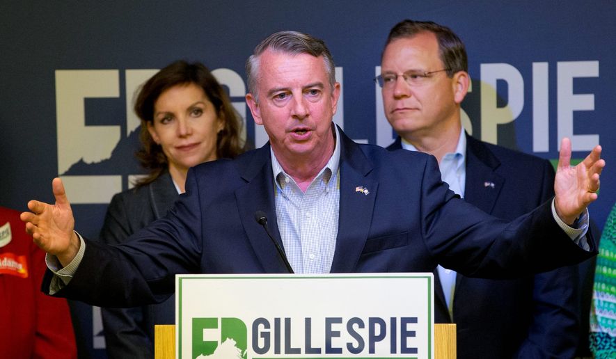 Republican candidate for governor, Ed Gillespie, center, gestures during a news conference with his running mates, Lt. Gov. candidate Jill Vogel, left, and Attorney General candidate John Adams, right, Wednesday, June 14, 2017, in Richmond, Va. (AP Photo/Steve Helber) ** FILE **