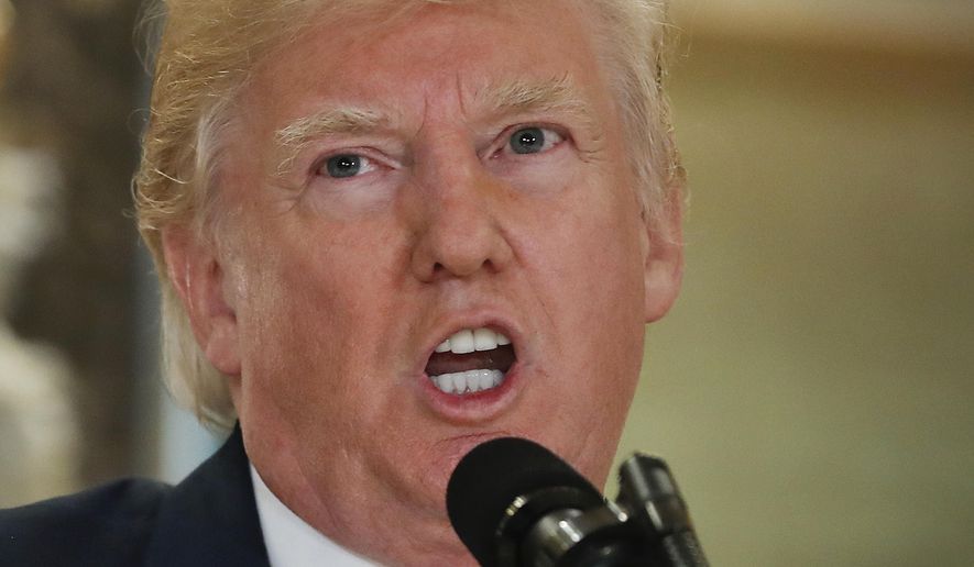 President Donald Trump speaks in the lobby of Trump Tower in New York, Tuesday, Aug. 15, 2017. (AP Photo/Pablo Martinez Monsivais)
