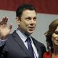 This May 20, 2017, file photo shows then-Rep. Jason Chaffetz waving to the Utah GOP Convention while his wife Julie looks on in Sandy, Utah. (AP Photo/Rick Bowmer, File)