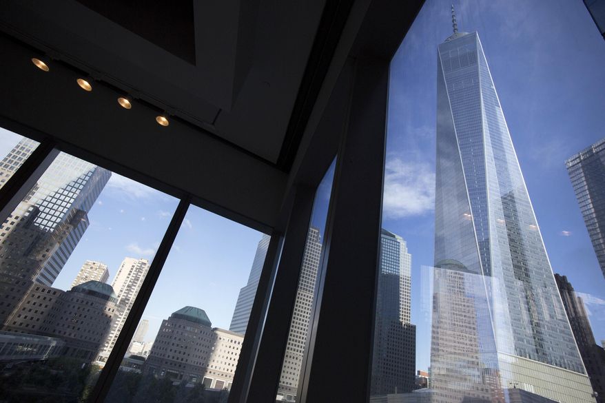 FILE - In this Aug. 15, 2016, file photo, window seating in the Eataly restaurant offers a view of One World Trade Center, right, in New York. On Tuesday, Aug. 15, 2017, the Federal Reserve Bank of New York issues its Empire State manufacturing index for August. (AP Photo/Mark Lennihan, File)