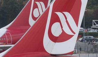 FILE -In this Sept. 29, 2016 file photo shows an  aircraft of the Air Berlin company on the runway of Dusseldorf airport in Germany. Struggling German carrier Air Berlin says it&#x27;s filing for bankruptcy after its main shareholder, Abu Dhabi-based Etihad, said it would make no more financing available. The Economy Ministry and Transport Ministry said Tuesday Aug. 15, 2017  in a statement that the airline would get a loan of 150 million euros ($177 million) so that it can continue flights for the time being.  (Bernd Thissen/dpa via AP,file)