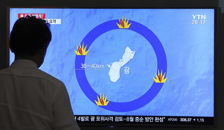 In this Aug. 10, 2017, file photo, a man watches a TV screen showing a local news program reporting on North Korea's threats to strike Guam with ballistic missiles, at the Seoul Train Station in Seoul, South Korea. If, after all the fanfare, North Korean leader Kim Jong Un doesn’t actually launch missiles toward Guam, many may write the whole episode off as another of the North’s seemingly endless bluffs. But from Pyongyang’s perspective and in the eyes of some U.S. military experts, Kim and his generals have already won this round. (AP Photo/Ahn Young-Joon, File)