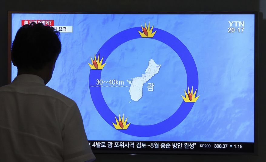 In this Aug. 10, 2017, file photo, a man watches a TV screen showing a local news program reporting on North Korea's threats to strike Guam with ballistic missiles, at the Seoul Train Station in Seoul, South Korea. If, after all the fanfare, North Korean leader Kim Jong Un doesn’t actually launch missiles toward Guam, many may write the whole episode off as another of the North’s seemingly endless bluffs. But from Pyongyang’s perspective and in the eyes of some U.S. military experts, Kim and his generals have already won this round. (AP Photo/Ahn Young-Joon, File)
