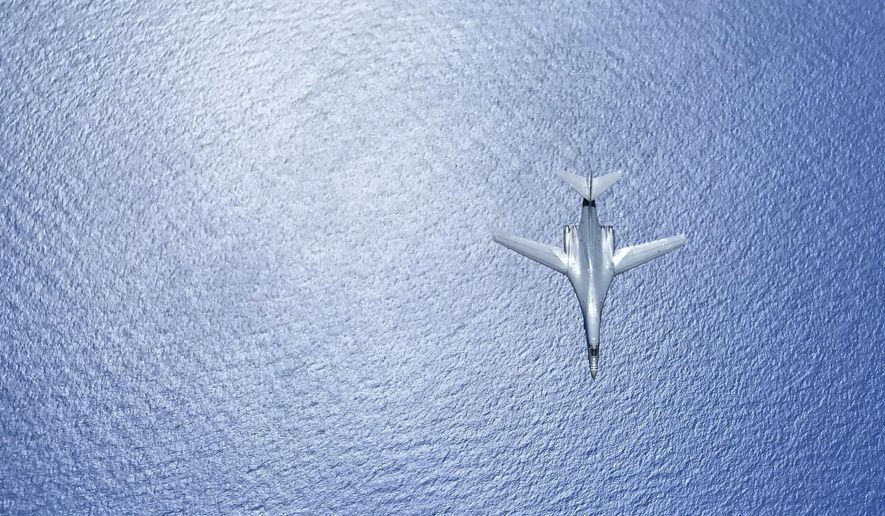 In this image provided by the U.S. Air Force, a U.S. Air Force B-1B Lancer assigned to the 37th Expeditionary Bomb Squadron, deployed from Ellsworth Air Force Base, South Dakota, in flight during a 10-hour mission from Andersen Air Force Base, Guam, flying in the vicinity of Kyushu, Japan, the East China Sea, and the Korean peninsula, Aug. 7, 2017 (HST). (Airman 1st Class Gerald Willis/U.S. Air Force via AP)