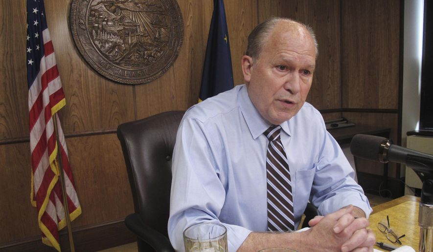 In this June 8, 2017, file photo, Alaska Gov. Bill Walker meets with reporters in Juneau. (AP Photo/Becky Bohrer, File)