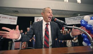 Provo Mayor John Curtis celebrates after winning Utah&#39;s Republican primary to fill the U.S. House seat vacated by Jason Chaffetz Tuesday, Aug. 15, 2017, in Provo, Utah. Curtis of Provo, defeated former state lawmaker Chris Herrod and business consultant Tanner Ainge, son of Boston Celtics president Danny Ainge. (AP Photo/Rick Bowmer)