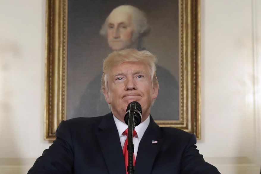 In this Aug. 14, 2017, photo, President Donald Trump pauses while speaking in the Diplomatic Reception Room of the White House in Washington. Is it really so far-fetched to put Robert E. Lee in the same category as George Washington, as President Donald Trump suggested Tuesday? Many historians say yes. (AP Photo/Evan Vucci, File)
