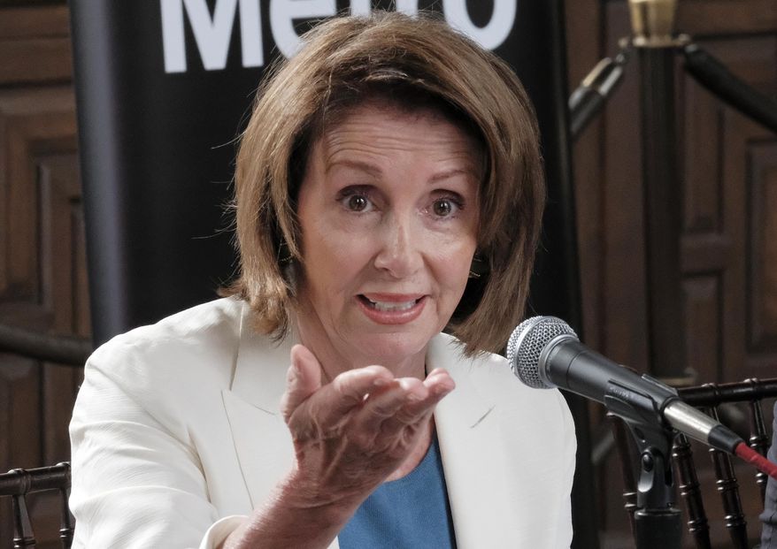 House Minority Leader Nancy Pelosi of Calif, takes questions during an infrastructure roundtable meeting at Union Station in Los Angeles on Wednesday, Aug. 16, 2017. Pelosi is criticizing Republicans who haven't spoken out against President Donald Trump's comments on white supremacists. (AP Photo/Richard Vogel)