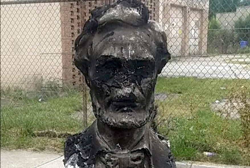 Chicago Alderman Raymond Lopez shared a picture of a charred statue of Abraham Lincoln on Facebook, Aug. 16, 2017. He implored citizens with information to contact his office or the please immediately. (Facebook, Raymond Lopez)