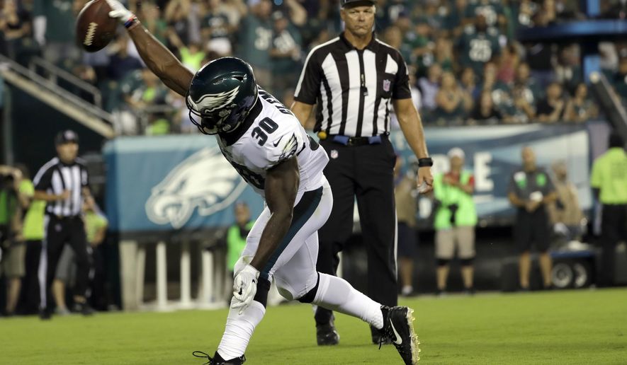 Philadelphia Eagles' Corey Clement celebrates after scoring a touchdown during the first half of an NFL preseason football game against the Buffalo Bills, Thursday, Aug. 17, 2017, in Philadelphia. (AP Photo/Michael Perez)