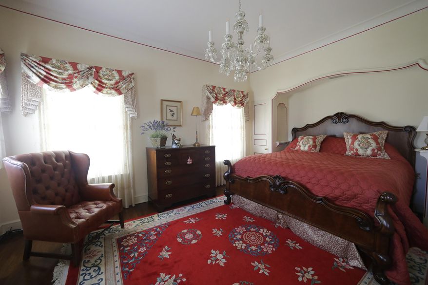 ADVANCE FOR MONDAY, AUG. 21 AND THEREAFTER - An Aug. 9, 2017 photo shows a downstairs guest room at the J. Leslie Sensenbrenner mansion at 265 N. Park Ave., in Neenah, Wis. The last of the great homes built from the boom years of Neenah's paper industry has hit the market. (Dan Powers/The Post-Crescent via AP)