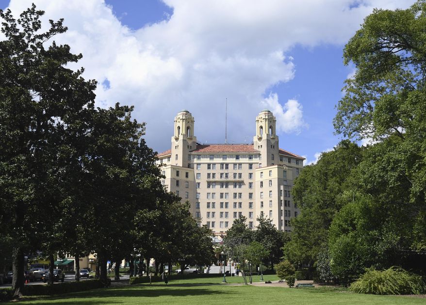 This Wednesday, Aug. 16, 2017, photo shows The Arlington Resort Hotel and Spa in Hot Springs, Ark. The landmark hotel in central Arkansas where one of the world's most famous mobsters frequented is in jeopardy of closing if safety concerns aren't addressed by November. (Mara Kuhn/The Sentinel-Record via AP)