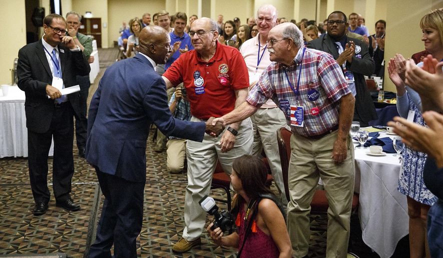 Illinois Secretary of State Jesse White announced that he would seek re-election in 2018 during the Illinois Democratic County Chairmen's Association 2017 Annual Chairmen's Brunch Thursday, Aug. 16, 2017 at the Crowne Plaza in Springfield, Ill. White, who is 83 years-old, has served five terms. (Rich Saal/The State Journal-Register via AP)