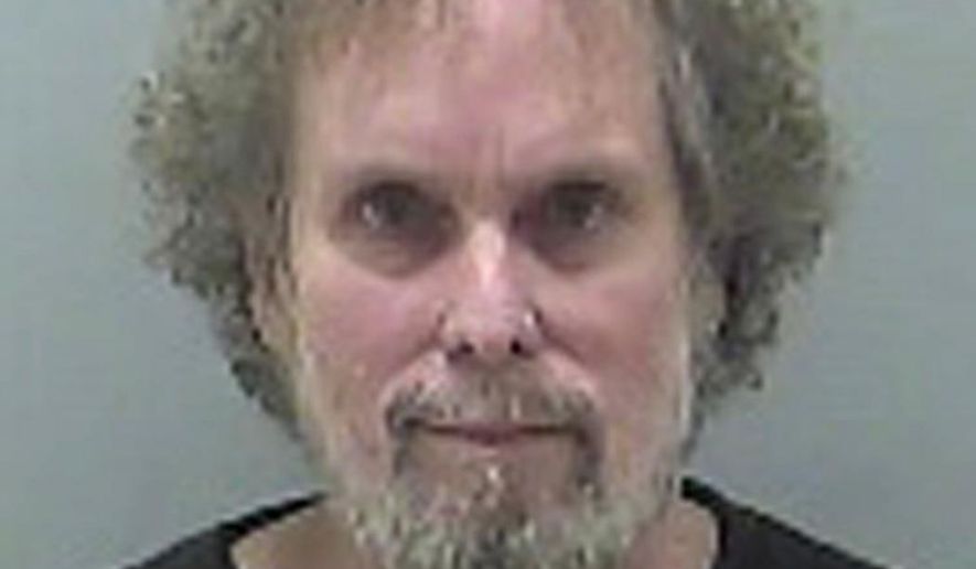 FILE – This undated file photo provided by the Delaware County Sheriff's Office in Delaware, Ohio, shows Tommy Thompson, jailed on contempt-of-court charges since December 2015 for violating terms of a plea deal by refusing to respond to questions about the location of 500 missing gold coins. The ex-treasure hunter is ready to argue before an Ohio judge why his imprisonment should be ended. Federal Judge Algenon Marbley has scheduled a hearing for Friday, Aug. 18, 2017, in Columbus. (Delaware County Sheriff's Office via AP, File)