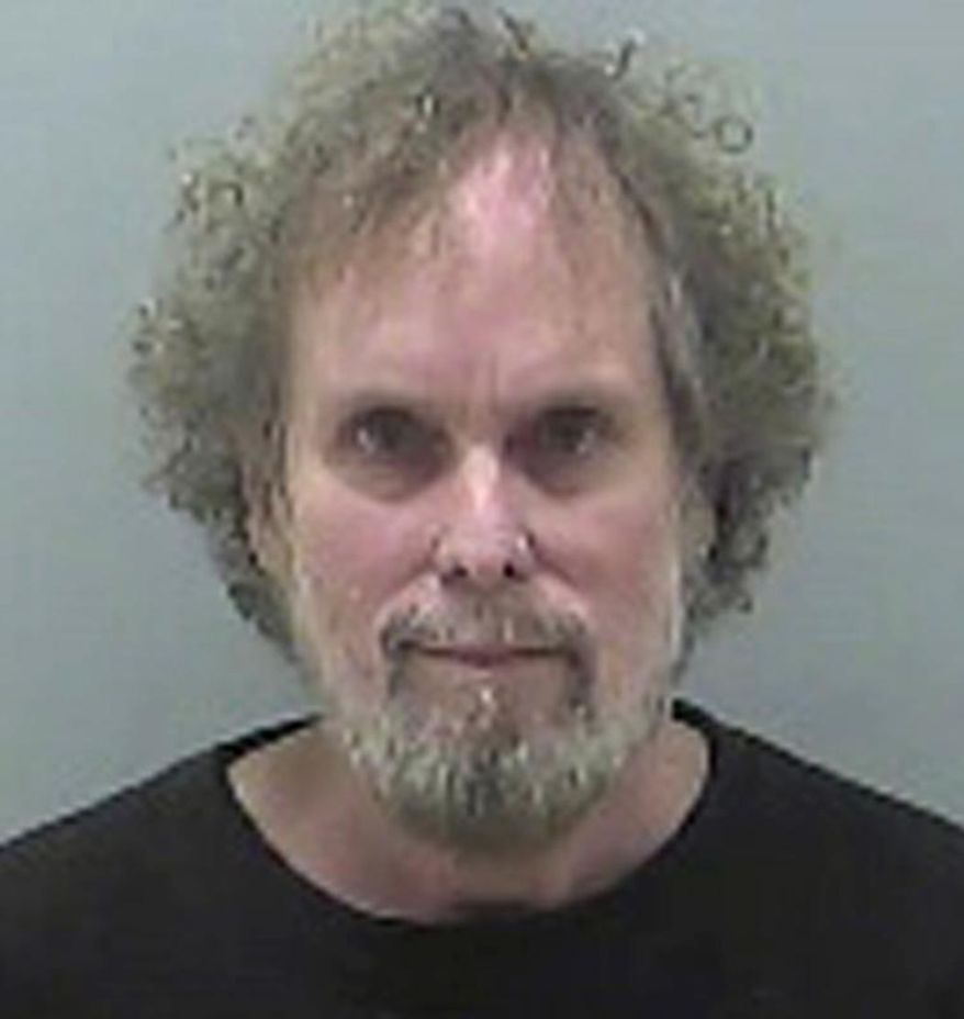 FILE – This undated file photo provided by the Delaware County Sheriff's Office in Delaware, Ohio, shows Tommy Thompson, jailed on contempt-of-court charges since December 2015 for violating terms of a plea deal by refusing to respond to questions about the location of 500 missing gold coins. The ex-treasure hunter is ready to argue before an Ohio judge why his imprisonment should be ended. Federal Judge Algenon Marbley has scheduled a hearing for Friday, Aug. 18, 2017, in Columbus. (Delaware County Sheriff's Office via AP, File)
