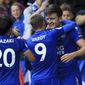 Leicester City&#x27;s Harry Maguire, right, celebrates scoring his side&#x27;s second goal during their English Premier League soccer match against Brighton at the King Power Stadium, Leicester, England, Saturday, Aug. 19, 2017. (Nigel French/PA via AP)