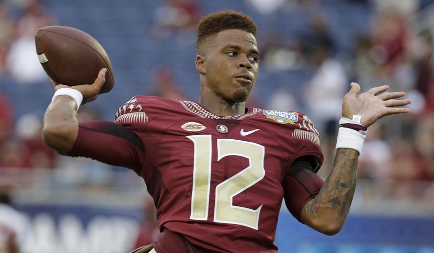 In this Sept. 5, 2016 file photo, Florida State quarterback Deondre Francois (12) warms up before an NCAA college football game against Mississippi in Orlando, Fla. Francois led FBS freshmen quarterbacks in passing yards last year and led Florida State to a 10-3 record despite being constantly under pressure in the pocket. Francois is firmly in control of the Seminoles' offense and hopes that last year's lessons pay off into a successful season. (AP Photo/John Raoux. File)