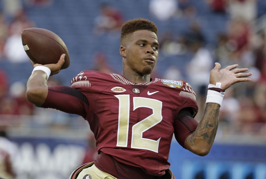 In this Sept. 5, 2016 file photo, Florida State quarterback Deondre Francois (12) warms up before an NCAA college football game against Mississippi in Orlando, Fla. Francois led FBS freshmen quarterbacks in passing yards last year and led Florida State to a 10-3 record despite being constantly under pressure in the pocket. Francois is firmly in control of the Seminoles' offense and hopes that last year's lessons pay off into a successful season. (AP Photo/John Raoux. File)