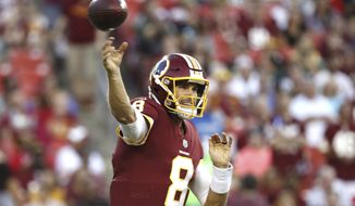 Washington Redskins quarterback Kirk Cousins (8) passes the ball during the first half of an NFL preseason football game against the Green Bay Packers in Landover, Md., Saturday, Aug. 19, 2017. (AP Photo/Alex Brandon)