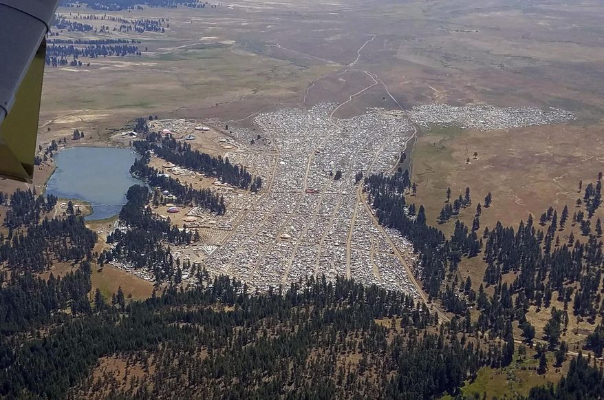 This Saturday, Aug. 19, 2017 photo provided by the Oregon State Police shows the crowd at the Big Summit Eclipse 2017 event near Prineville, Ore. The full solar eclipse will happen Monday, Aug. 21, 2017. (Oregon State Police via AP)