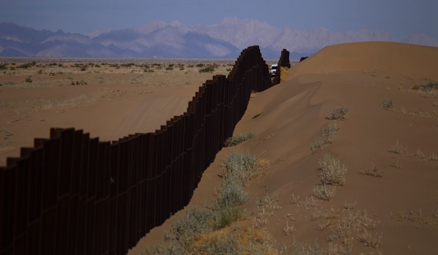 A triple layer of fencing, more Border Patrol agents and bollard-style barriers along the border have reduced illegal crossings from Mexico into Yuma, Arizona, by nearly 90 percent. President Trump is due to visit the border town, considered a monumental success, on Tuesday. (Associated Press)