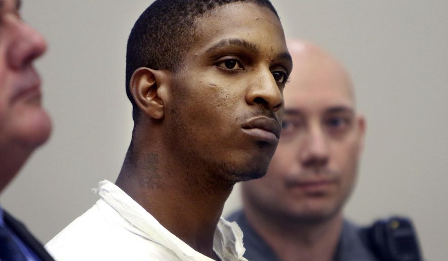 Anthony Rutherford listens during his arraignment in court in Waterbury, Conn., Monday, Aug. 21, 2017. Rutherford is accused of killing an anti-domestic violence activist and her 9-year-old daughter. (Steven Valenti/The Republican-American via AP, Pool)
