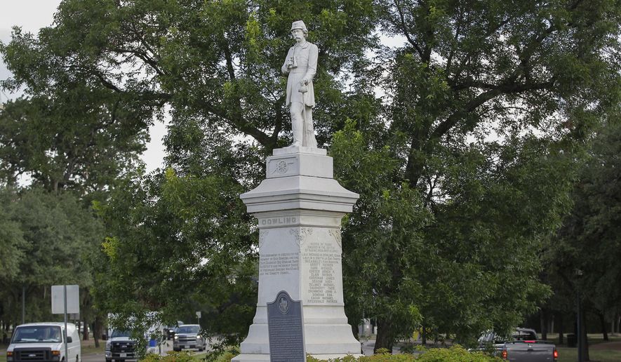 The Richard Dowling statue is shown near the entrance to Hermann Park Monday, Aug. 21, 2017, in Houston. A Houston man was taken into custody on allegations he tried to plant explosives at the statue of Confederate officer Richard Dowling in Hermann Park, according to a high-level law enforcement official familiar with the investigation.(Steve Gonzales/Houston Chronicle via AP)