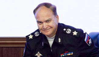 In this file photo taken on Friday, Oct. 7, 2016, then-Russian Deputy Defense Minister Anatoly Antonov smiles at a briefing in the Defense Ministry in Moscow, Russia. Antonov, who has gained the reputation of a hawk during his earlier tenure at the Defense Ministry, was subsequently named Russian ambassador to the United States. (AP Photo/Ivan Sekretarev, File)