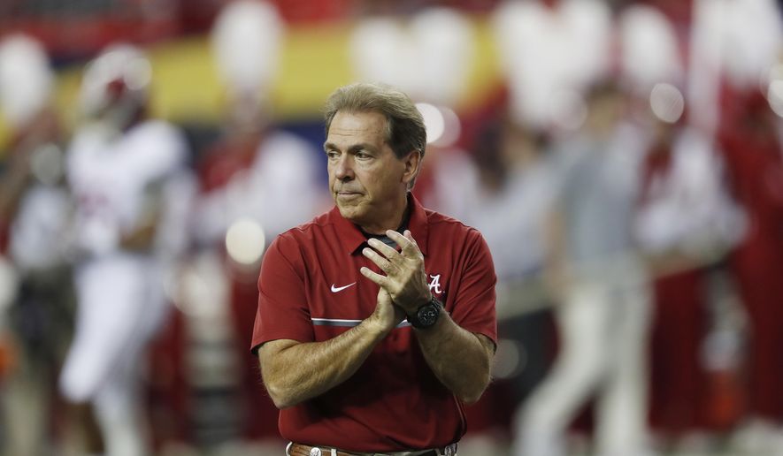 FILE - In this Dec. 3, 2016, file photo, Alabama coach Nick Saban watches his team warm up for the Southeastern Conference championship NCAA college football game between Alabama and Florida in Atlanta. Alabama has the No. 1 spot in The Associated Press' preseason media poll. Saban's Tide has become the surest thing in sports these days. They don't always win the national championship _ just half the time over the last eight years–but they are always in contention. Since 2008, only once has the Tide lost more than one game before bowl season. (AP Photo/John Bazemore, File)