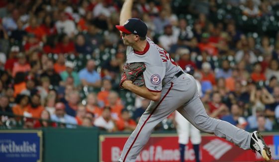 Washington Nationals&#39; Brandon Kintzler delivers a pitch against the Houston Astros during the ninth inning of a baseball game Thursday, Aug. 24, 2017, in Houston. (AP Photo/Richard Carson)