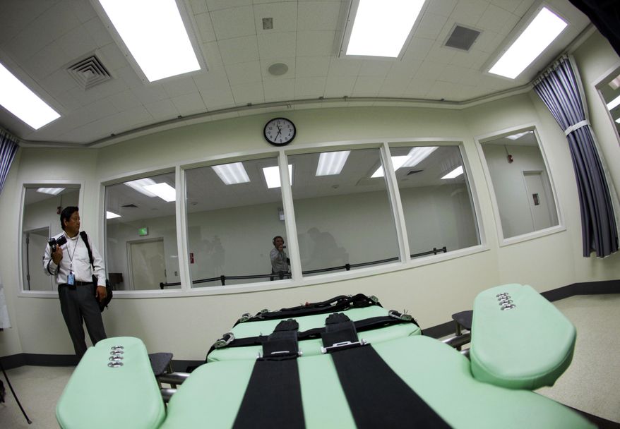 FILE - This Sept. 21, 2010 file photo shows an inmate's view of the interior of the lethal injection facility at San Quentin State Prison in San Quentin, Calif. California's Supreme Court has announced it will issue a long-awaited ruling on Proposition 66, the measure voters approved in 2016 to speed up the death penalty. The decision will be released Thursday morning, Aug. 24, 2017. (AP Photo/Eric Risberg, File)