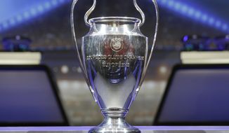 The trophy of UEFA Champions League is put on display before the UEFA Champions League draw at the Grimaldi Forum, in Monaco, Thursday, Aug. 24, 2017. (AP Photo/Claude Paris)