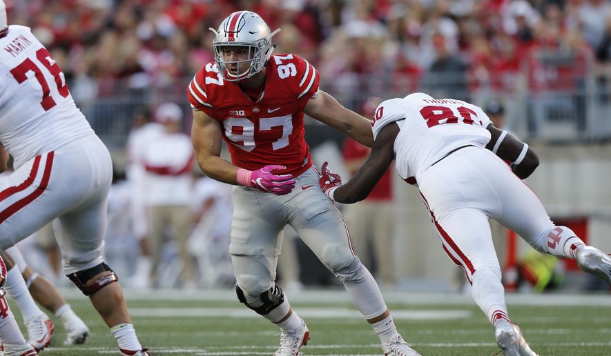 FILE - In this Oct. 8, 2016, file photo, Ohio State defensive end Nick Bosa plays against Indiana during an NCAA college football game, in Columbus, Ohio. Bosa embraces his identity as the younger brother of former Buckeyes superstar Joey Bosa. Nick says he’s more comfortable this year and quicker off the line, and a new scheme that gives defensive ends more opportunities to make plays could allow him to start pursuing the sack numbers piled up by his sibling, now with the Chargers. (AP Photo/Jay LaPrete, File)