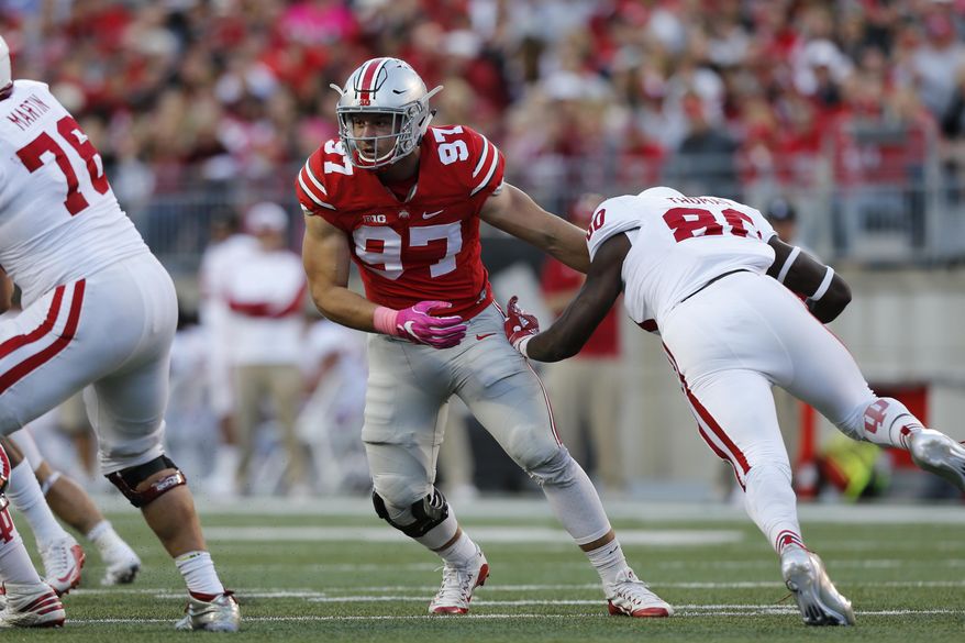 FILE - In this Oct. 8, 2016, file photo, Ohio State defensive end Nick Bosa plays against Indiana during an NCAA college football game, in Columbus, Ohio. Bosa embraces his identity as the younger brother of former Buckeyes superstar Joey Bosa. Nick says he’s more comfortable this year and quicker off the line, and a new scheme that gives defensive ends more opportunities to make plays could allow him to start pursuing the sack numbers piled up by his sibling, now with the Chargers. (AP Photo/Jay LaPrete, File)
