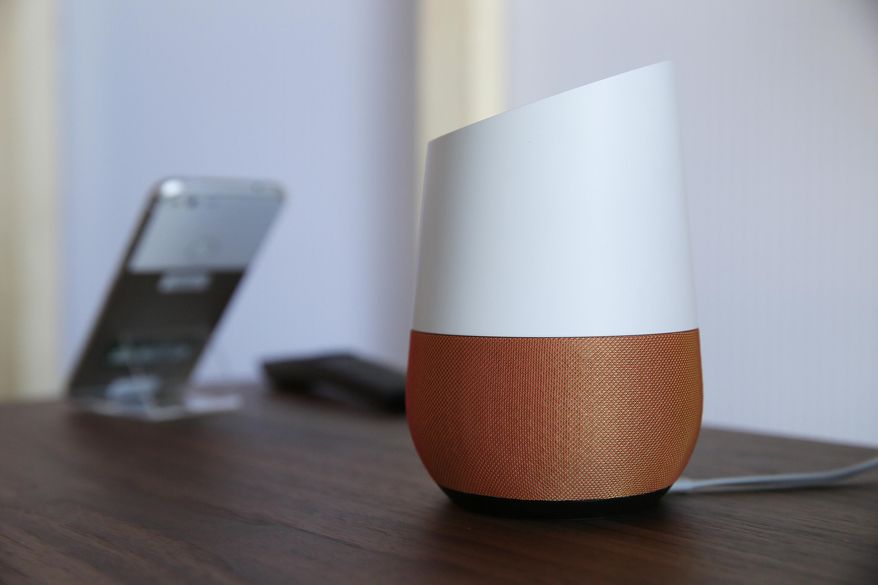 In this Tuesday, Oct. 4, 2016, file photo, Google Home, right, sits on display near a Pixel phone following a product event, in San Francisco. In the name of convenience, Amazon and Walmart are pushing people to shop by just talking to a digital assistant. Shopping by voice means giving orders to the Alexa assistant on Amazon’s Echo speaker and other devices, even if your hands are tied up with dinner or dirty diapers. And in September 2017, Walmart will start offering voice shopping, too, with the Google Assistant on the rival Home speaker. (AP Photo/Eric Risberg, File)
