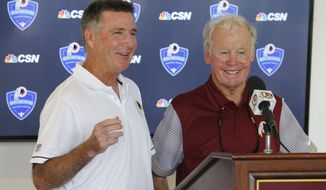 Washington Redskin general manager, Bruce Allen, left, announced that former Redskins GM Bobby Beathard, right, will be inducted in the Redskins Ring of Fame during a press conference at the Washington Redskins NFL football teams training camp in Richmond, Va., Saturday, July 30, 2016. (AP Photo/Steve Helber)