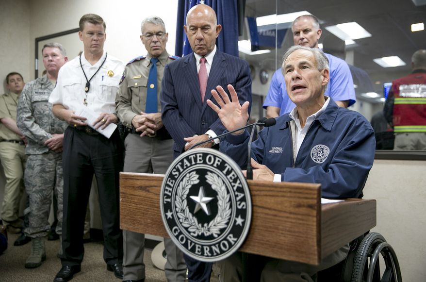 Gov. Greg Abbott speaks at a news conference about Hurricane Harvey at the State Operations Center in Austin, Texas, on Friday, Aug. 25, 2017. Hurricane Harvey is shaping up as just about a worst-case scenario storm with possible flooding from two different directions. ( Jay Janner/Austin American-Statesman via AP)