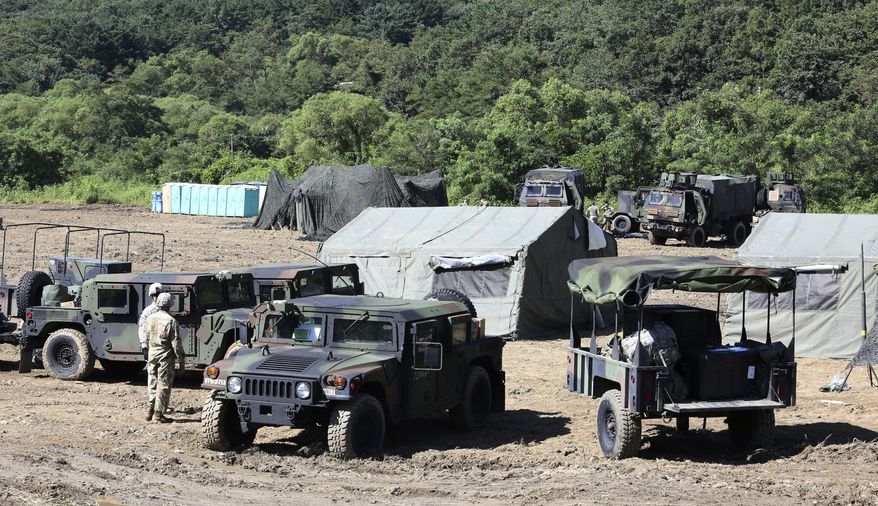 U.S. Army soldiers prepare their military exercise in Paju, South Korea, near the border with North Korea, Saturday, Aug. 26, 2017. Three North Korea short-range ballistic missiles failed on Saturday, U.S. military officials said, which, if true, would be a temporary setback to Pyongyang's rapid nuclear and missile expansion. (AP Photo/Ahn Young-joon)