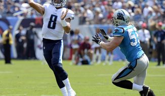 File-This Aig. 19, 2017, file photo shows Tennessee Titans quarterback Marcus Mariota (8) passing as he is pressured by Carolina Panthers linebacker David Mayo (55) in the first half of an NFL football preseason game  in Nashville, Tenn. The Titans believe Mariota is ready to blossom as a quarterback in his third NFL season, so they’re giving him a bit more responsibility. They’re trusting Mariota to make sure the Titans have the right play called before snapping the ball. (AP Photo/Mark Zaleski, File)