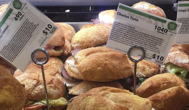 Although some fast-food chains began posting calorie counts a decade ago to comply with a patchwork of local laws, there has never been a national requirement until now. (Associated Press/File)