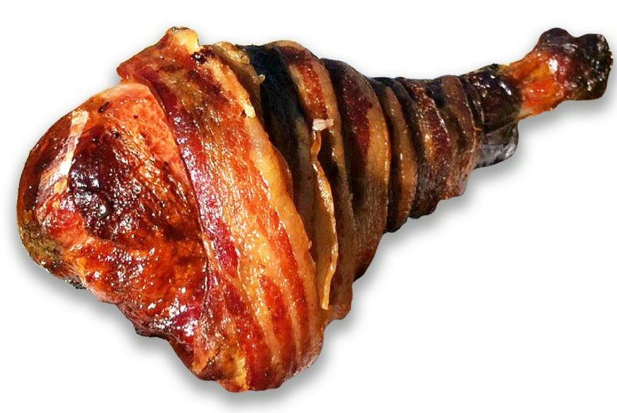 Deep-fried, bacon-heavy state fair food like this whole turkey leg is often an obligatory meal for politicians seeking to further a populist image. (Minnesota State Fair)