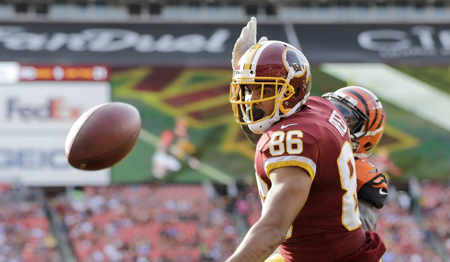Washington Redskins tight end Jordan Reed (86) watches the ball go by during a preseason NFL football game between the Cincinnati Bengals and Washington Redskins, Sunday, Aug. 27, 2017, in Landover, Md. (AP Photo/Mark Tenally) **FILE**