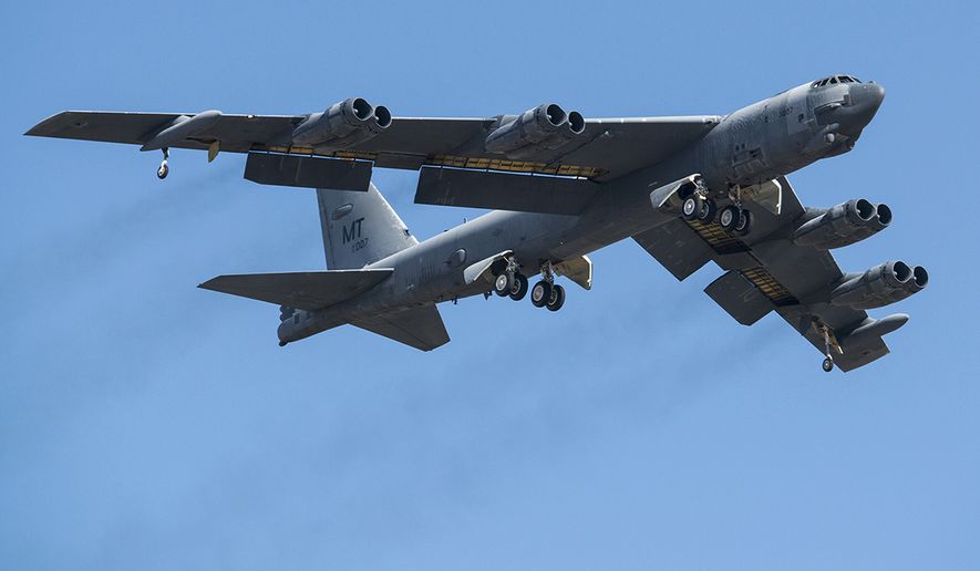 A B-52H Stratofortress takes off after being taken out of long term storage Feb. 13, 2015, at Davis-Monthan Air Force Base, Ariz. The aircraft was decommissioned in 2008 and has spent the last seven years sitting in the “Boneyard,” but was selected to be returned to active status and will eventually rejoin the B-52 fleet. The B-52 was flown by the 309th Aerospace Maintenance and Regeneration Group. (U.S. Air Force photo/Master Sgt. Greg Steele)